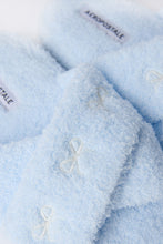 Pantoufles en bouclée pelucheuses croisées avec broderie thumbnail 12