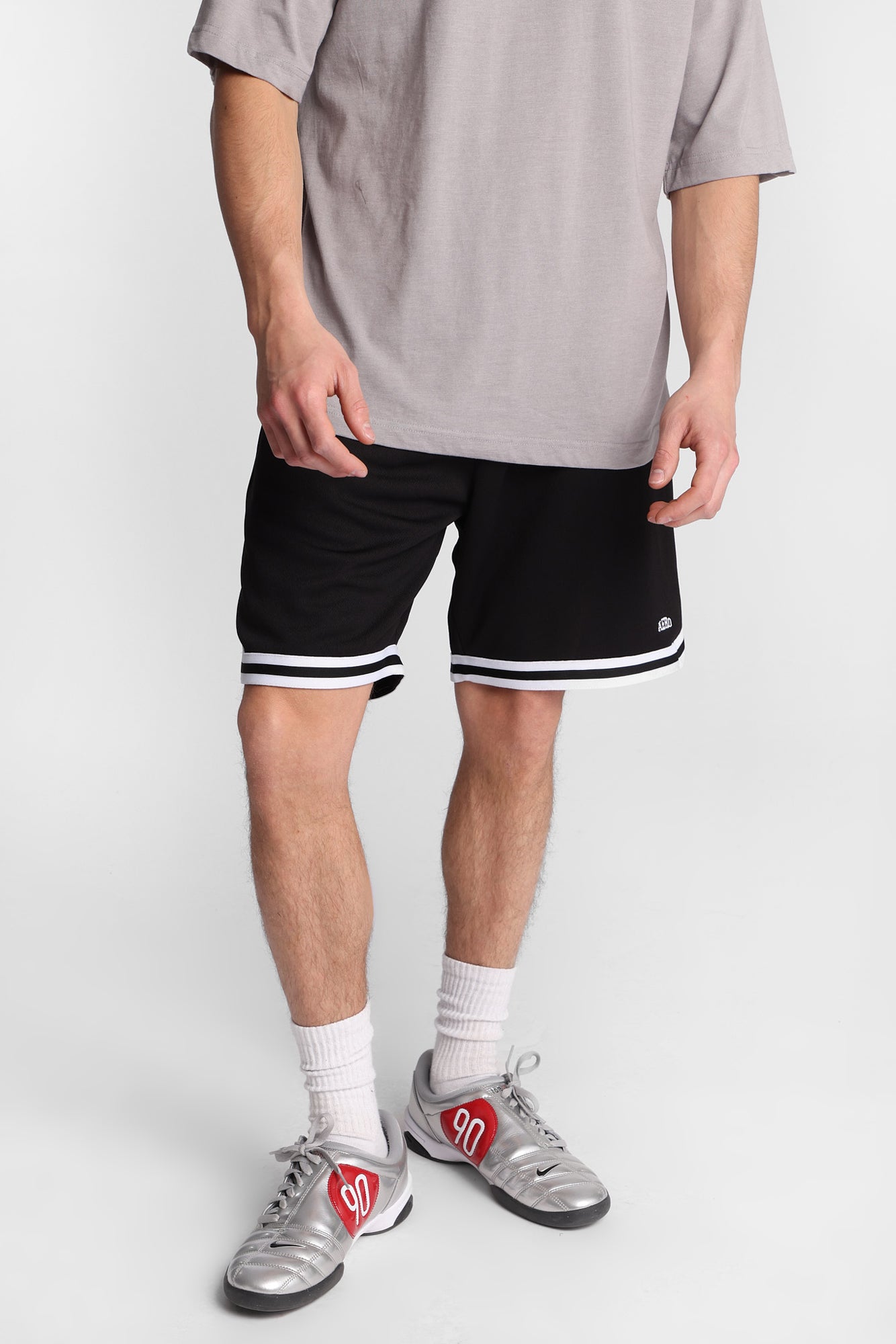 Short de sport en maille aérée à rayures AERO