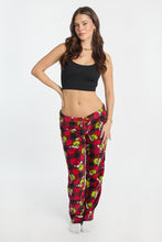 Pantalon pyjama pelucheux imprimé à carreaux Le Grinch thumbnail 4